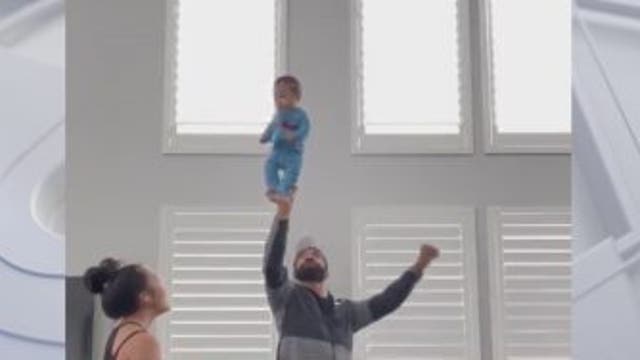 VIDEO: Dad doing cheerleading stunts with infant son goes viral on TikTok