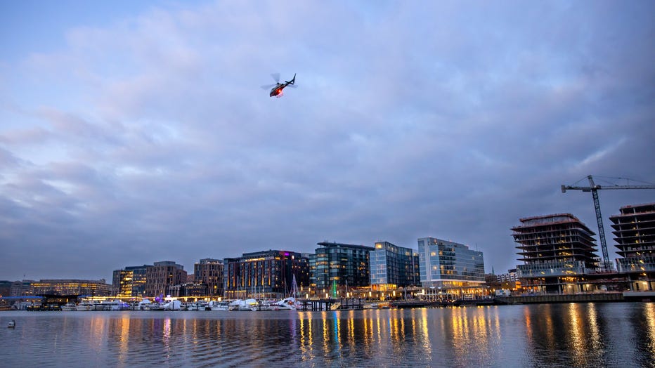 WASHINGTON,DC-DEC18: A helicopter from Fort Mc Nair flies over