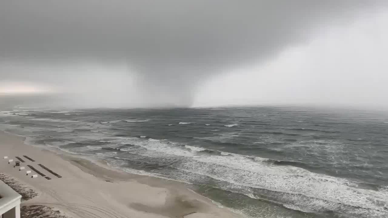 Watch Possible tornado comes ashore in Panama City Beach