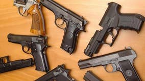 Iowa governor signs bill that removes permit requirements for handguns