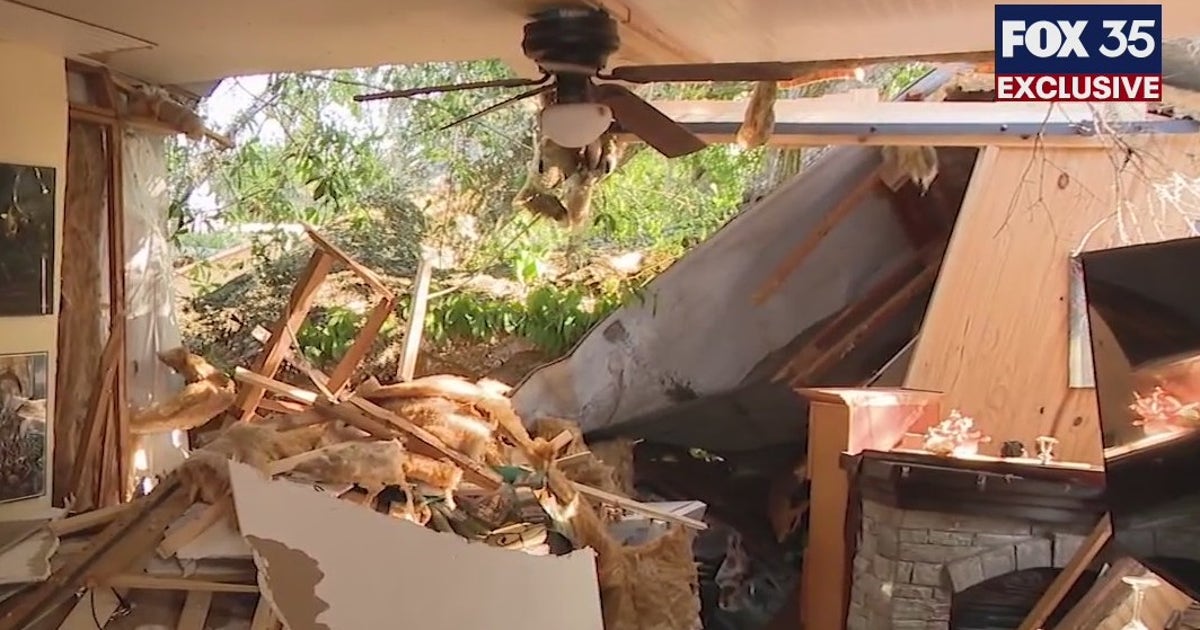 FOX 35 EXCLUSIVE: Woman rescued from mobile home after large tree fell ...
