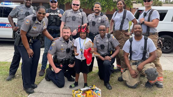 Daytona Beach firefighters, police surprise 5-year-old on birthday