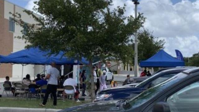 'We're all in this together': Vaccines, food, and shoes given out in Orange County