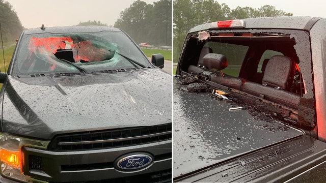 Lightning strikes Florida highway causing ‘chunk of road’ to fly through truck windshield, officials say