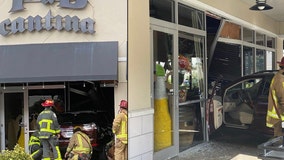 PHOTOS: SUV crashes through window of Central Florida restaurant