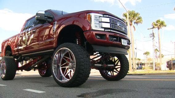 Truck Meet leaving Daytona Beach in rear-view