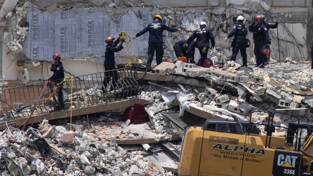 Vacationers offer assistance to families of those missing at collapsed condo site