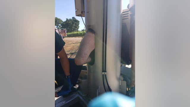 PHOTOS: California man 'inexplicably' climbs into farm equipment, gets stuck for two days