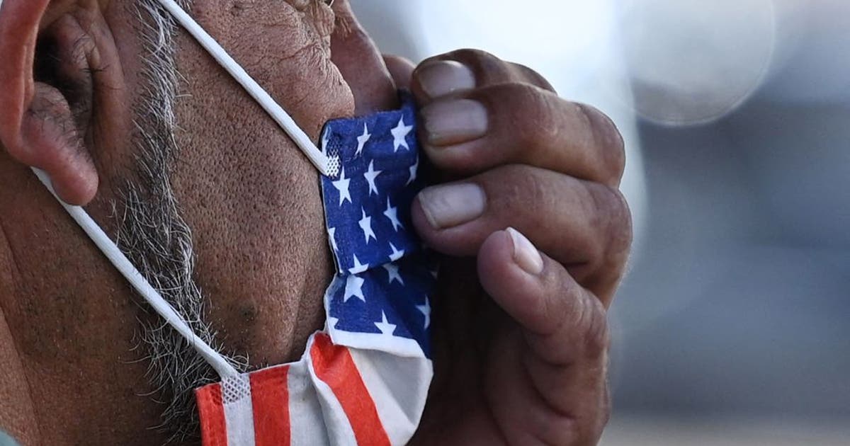 Should vaccinated people wear masks again with COVID-19 cases rising ...
