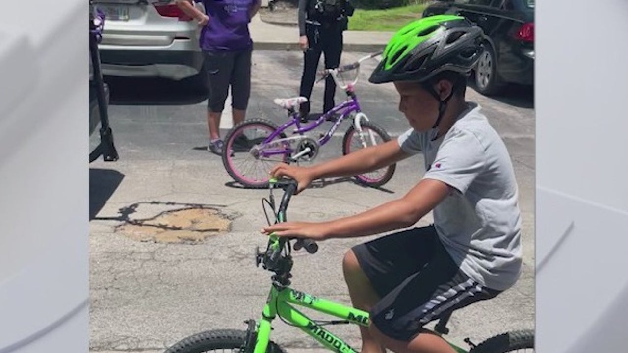Orlando Police surprise boy whose bike was stolen with new ride