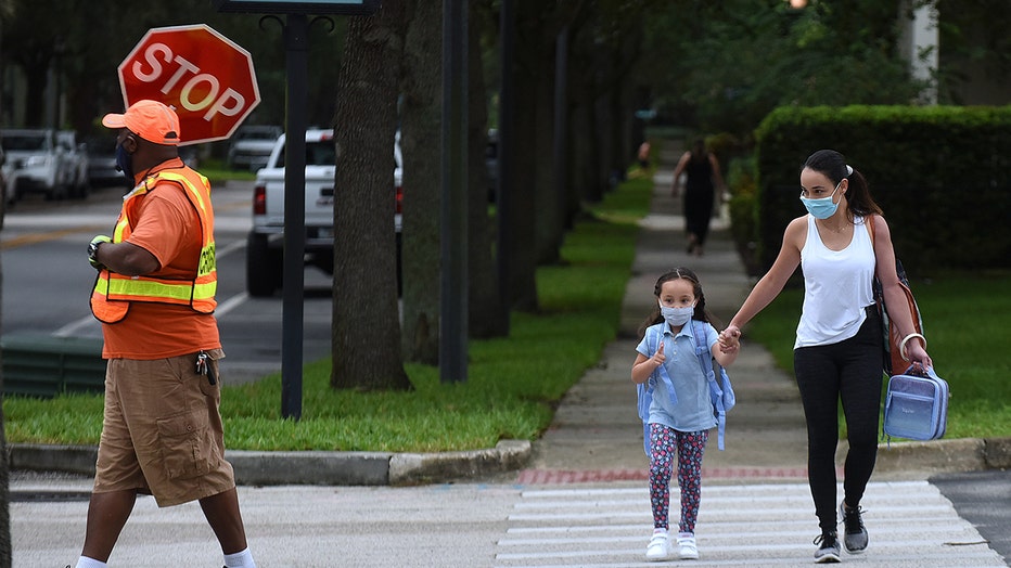 f4e4ea51-Students Return To Schools In Florida