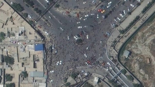 Satellite images show chaos at Kabul airport as people flee Afghanistan