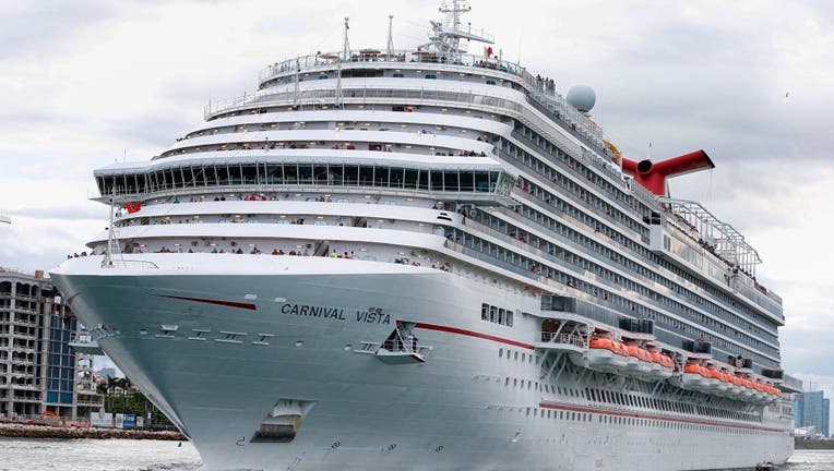 FILE - The Carnival Cruise Ship Carnival Vista heads out to sea in the Miami harbor entrance known as Government Cut in Miami, Florida, on June 2, 2018. (Photo credit: RHONA WISE/AFP via Getty Images)