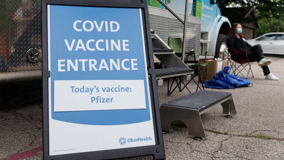 2d97d862-COVID vaccine sign