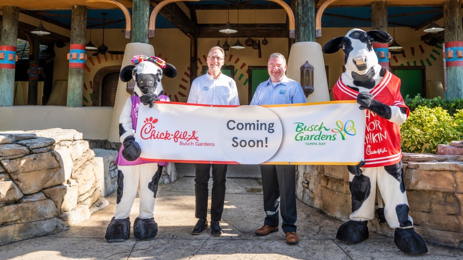 Chick-fil-A-cows-are-ready-to-welcome-the-new-restaurant-to-Busch-Gardens-with-Park-President-Neal-Thurman-and-Chick-fil-A-Operator-Denis-Spradlin.jpg