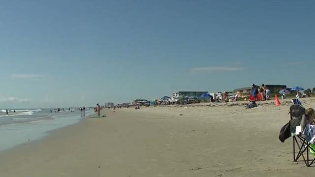 Families flock to the beach during Labor Day weekend