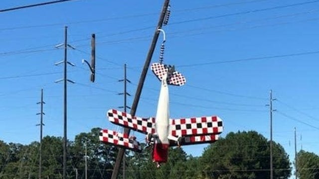 Florida pilot left dangling in power lines after plane crashes