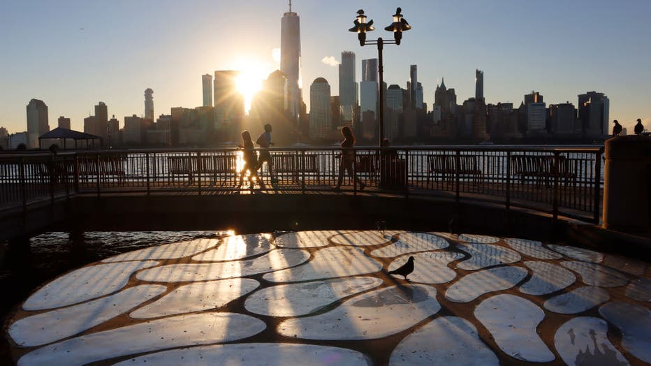 6641b953-Sunrise Behind Lower Manhattan in New York City