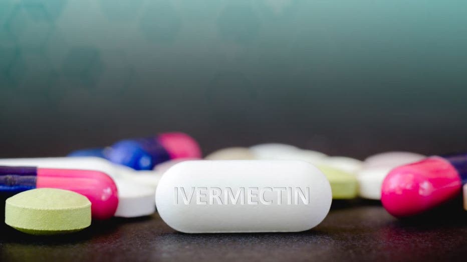0ee553d8-In this photo illustration, medicine pills and the text
