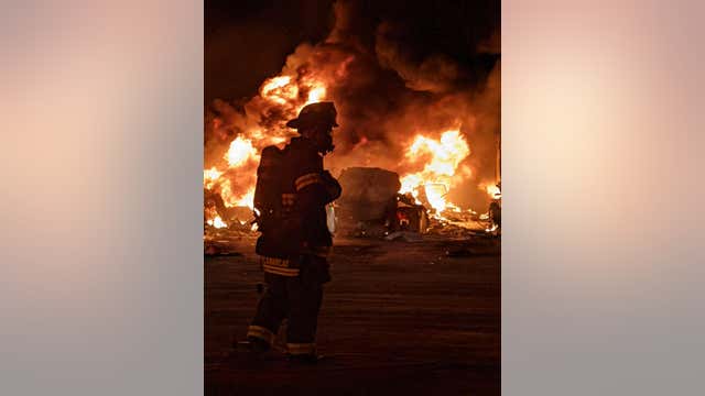Several semi trucks damaged in fire at Sanford truck lot
