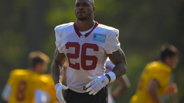 Former NFL MVP Adrian Peterson arrested at LAX