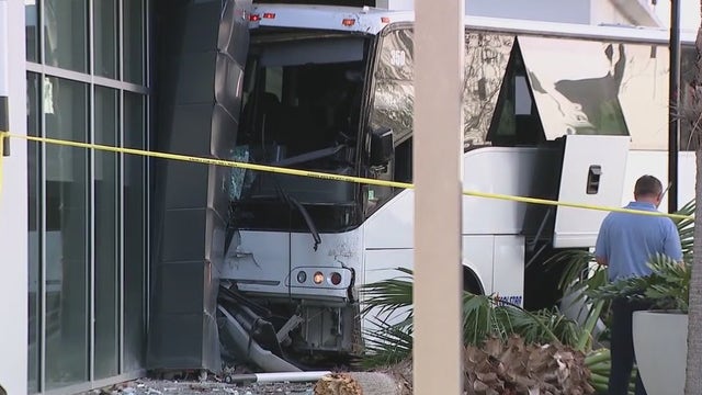Bus slams into building in Lake Nona