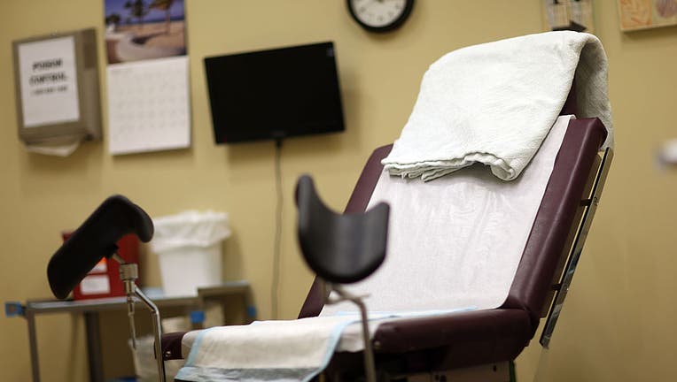 FILE IMAGE - An examination room is seen at a women's reproductive health center that provides abortions on May 7, 2015, in a city in South Florida. (Photo by Joe Raedle/Getty Images)