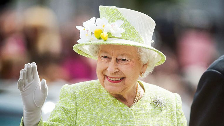 Queen Elizabeth waves to crowd
