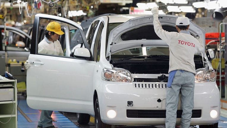 Workers at a Toyota Plant