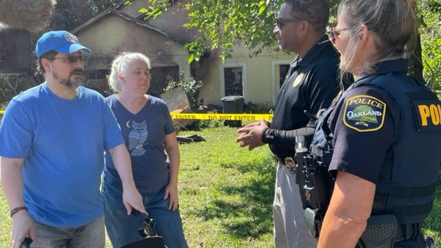 3 Oakland police officers rescue couple from burning home