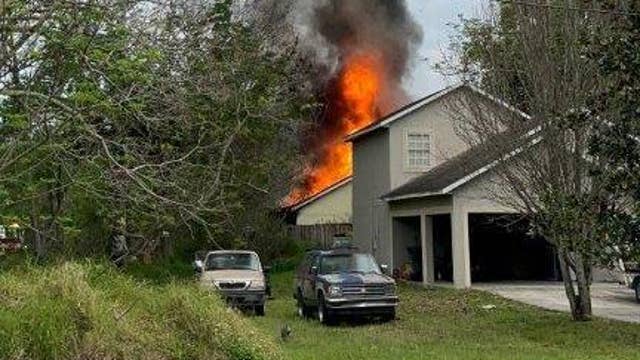 Three Florida police officers honored for saving couple from house fire
