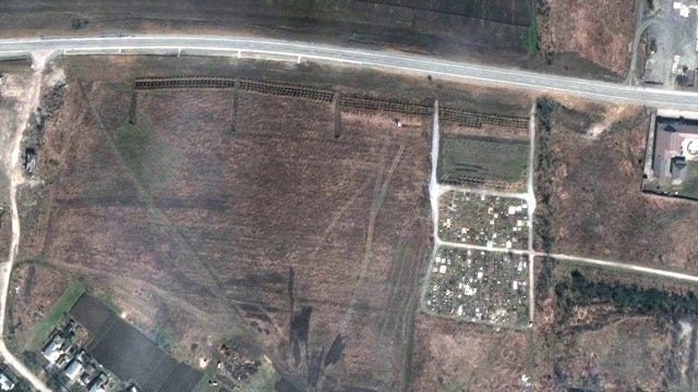 Satellite photos show possible mass graves near Mariupol as Russia attacks in east