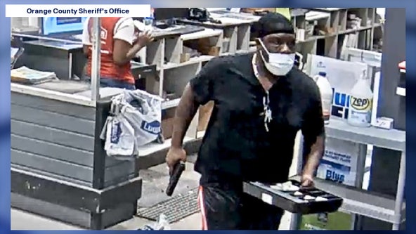 Caught on camera: Deputies search for armed man accused of robbing Orlando Lowe's store