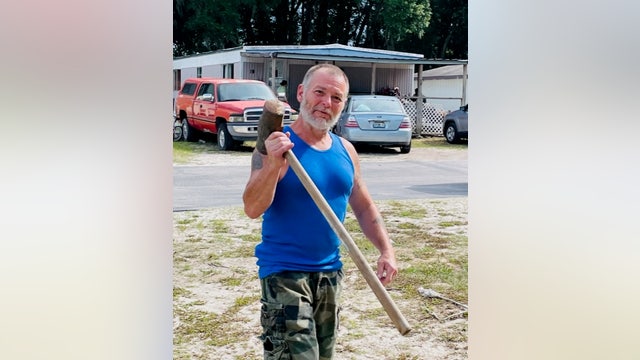 Neighbor uses sledgehammer to rescue disabled friend from burning home