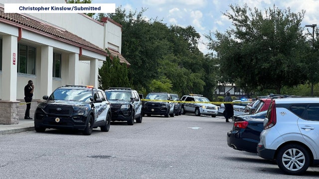 Woman's body may have been in vehicle outside Walgreens for days, DeLand police say