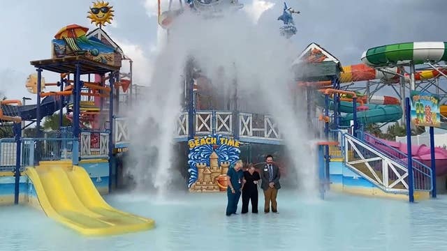 Orlando CEOs get drenched with huge bucket of water to raise money for ALS