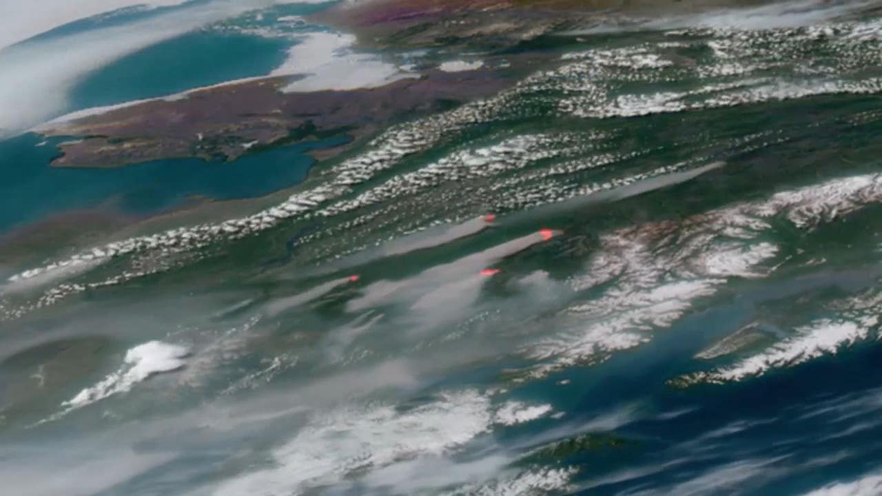 NOAA satellites capture record wildfires enveloping Alaska in smoke - Vimarsana News