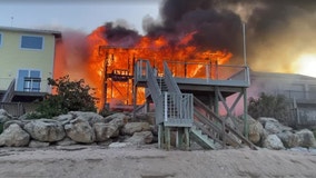 Firefighters put out large beach house fire in Volusia County