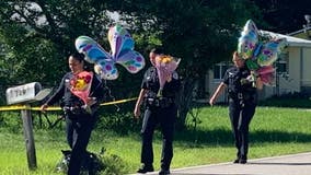 Longwood officers bring balloons, flowers to home where Florida girl stabbed to death, sister hurt