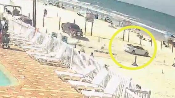 WATCH: Video shows car smashing into toll booth, driving into ocean at Daytona Beach