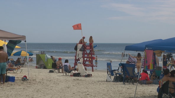 Lifeguards watch rip currents, lightning as people flock to beaches