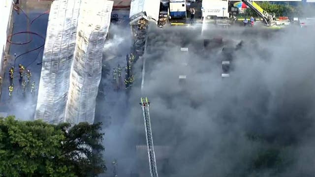 Massive fire reported at Miami flea market, near Miami International Airport