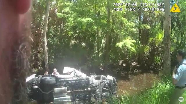 Woman dies days after being rescued from flipped over SUV partially submerged in water