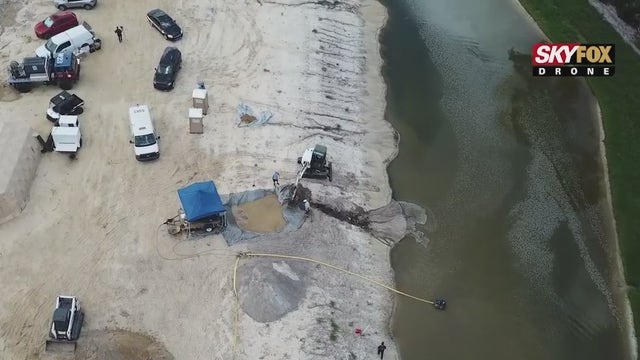 USF anthropologists inspecting human remains found at Palm Coast construction site