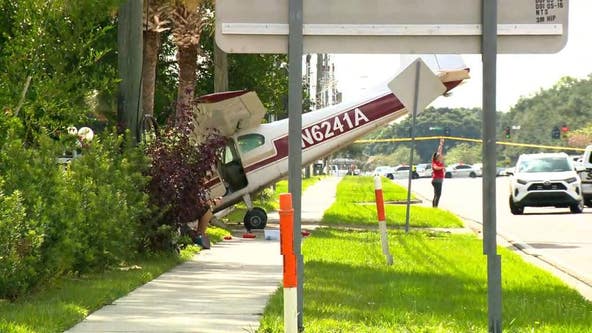 Small plane crash-lands near busy roadway in Orlando; no injuries reported, officials say