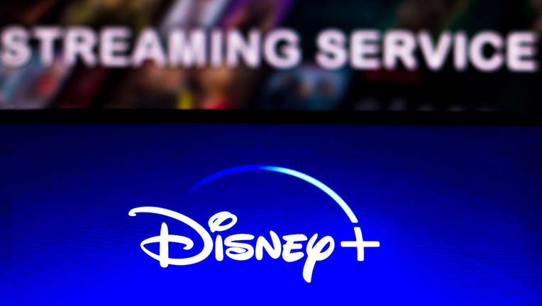In this photo illustration the Disney + (Plus) logo seen