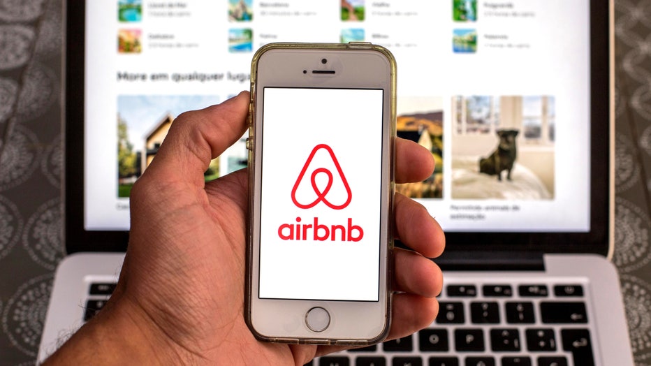 029816ba-In this photo illustration, the Airbnb app seen displayed on