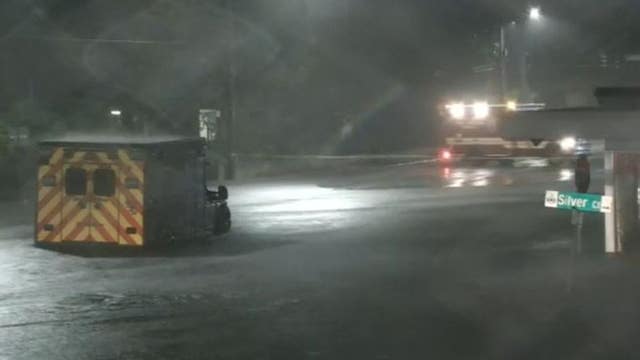 Ambulance trapped in severely flooded streets near downtown Orlando during Hurricane Ian