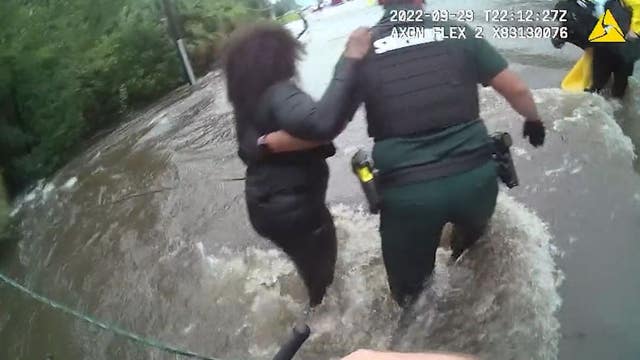 Florida deputies form human chain to save woman from rushing flood waters amid Hurricane Ian