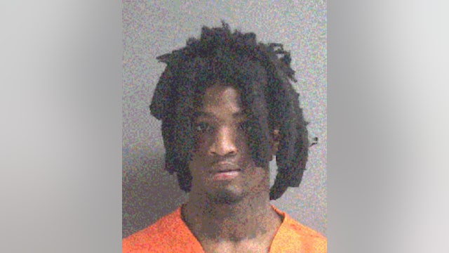 Man on the run after allegedly pulling gun during a fight at a high school football game